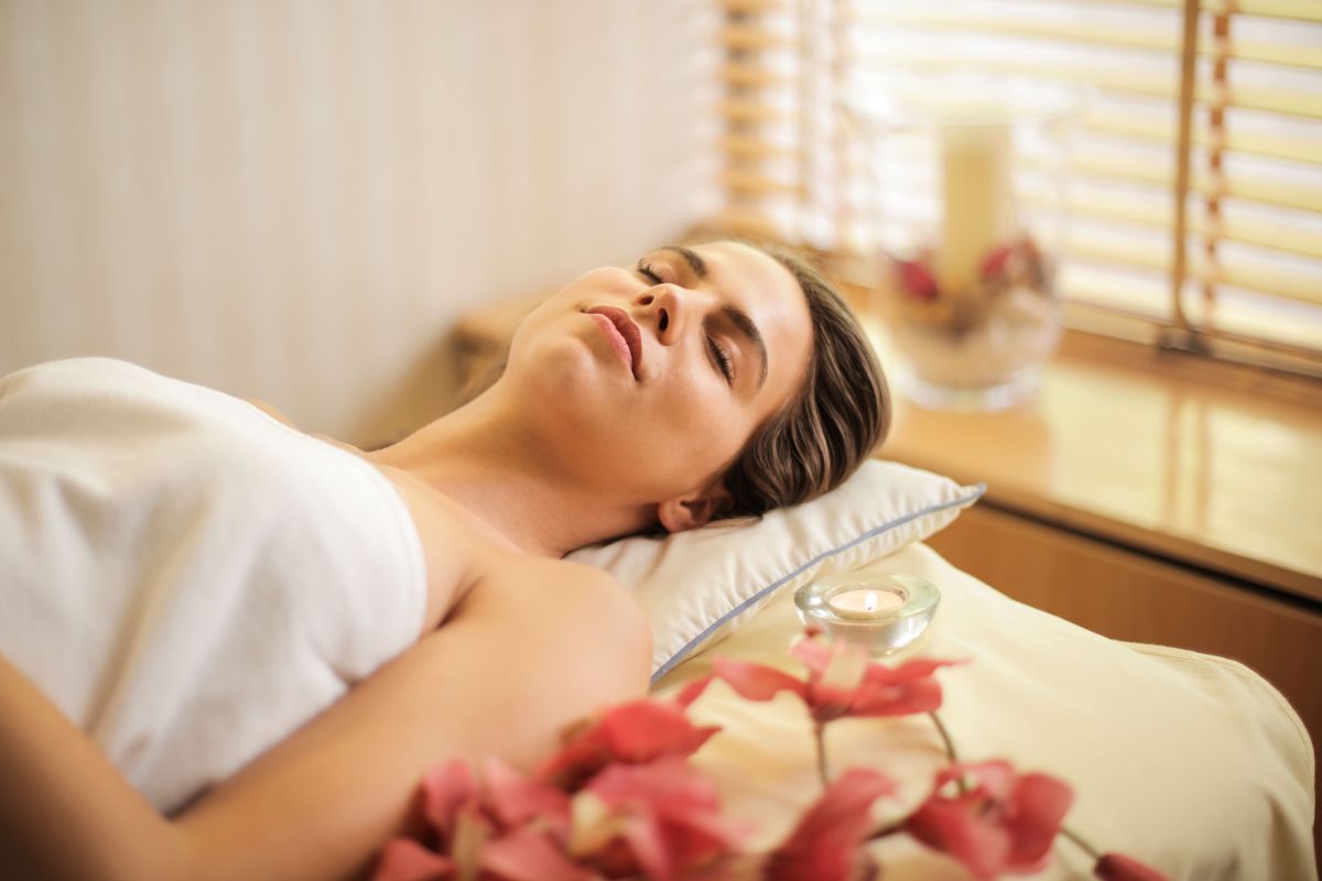 Serene spa treatment room with warm ambient lighting